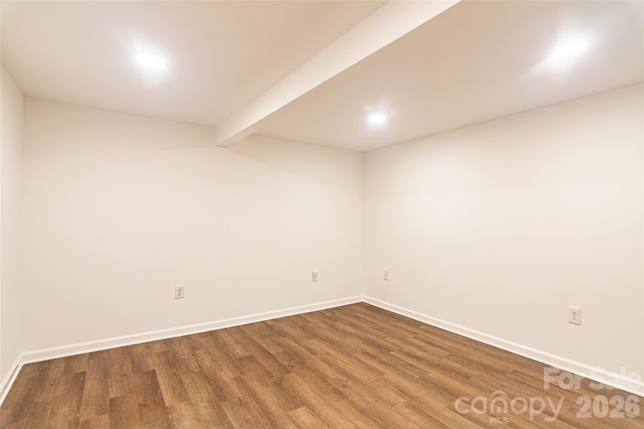 281 Jack McKinney Road Forest City, NC 28043 - Photo 29 of 37 an empty room with wooden floor