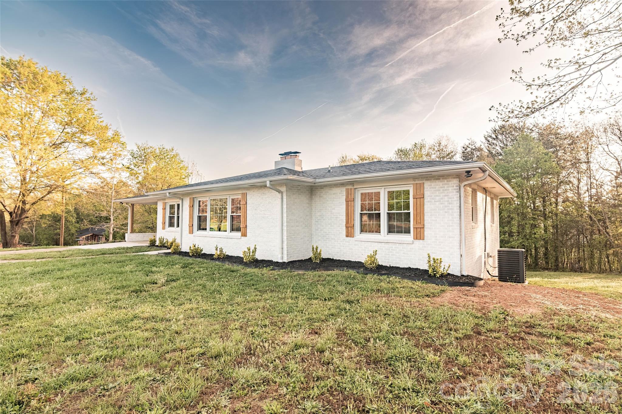 281 Jack McKinney Road Forest City, NC 28043 - Photo 3 of 37 a view of a house with a yard