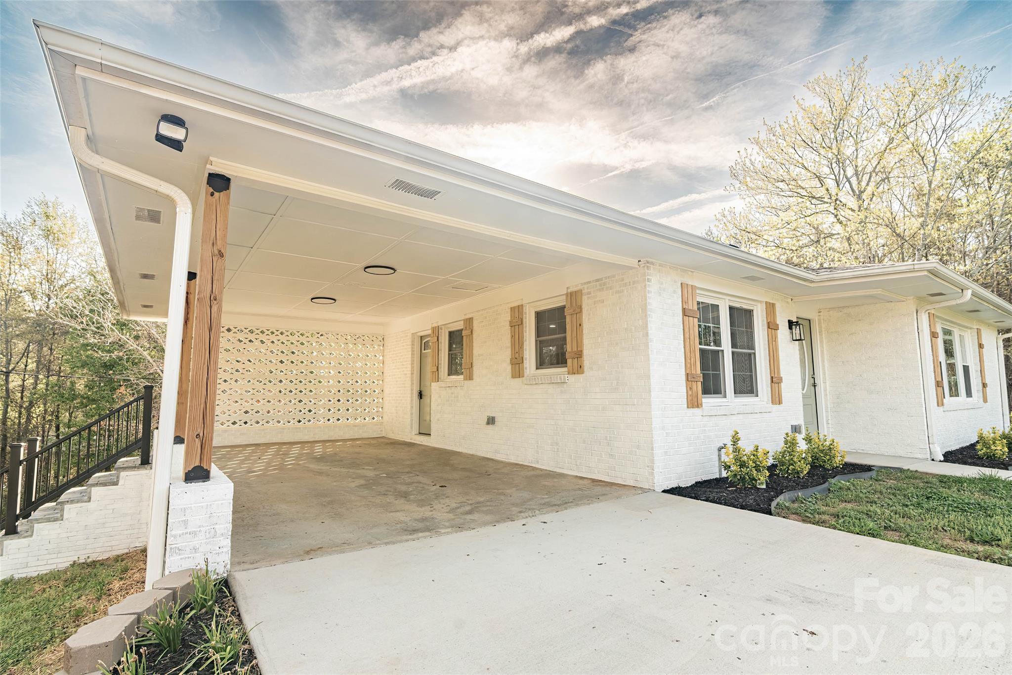 281 Jack McKinney Road Forest City, NC 28043 - Photo 5 of 37 a front view of a house with a yard