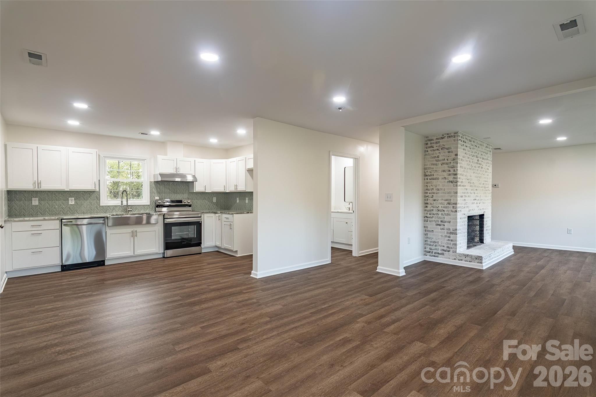 281 Jack McKinney Road Forest City, NC 28043 - Photo 7 of 37 a view of kitchen with wooden floor