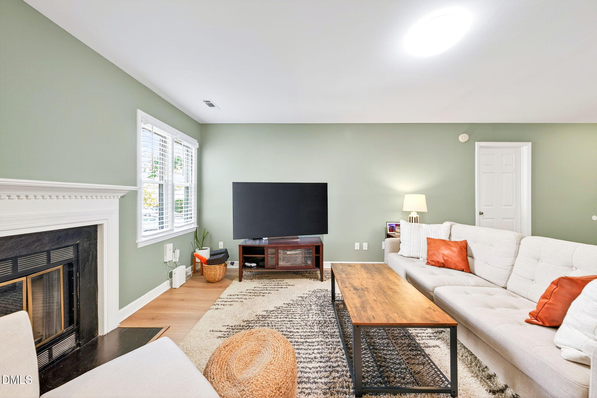 3307 Tarleton West Durham, NC 27713 - Photo 10 of 39 a living room with furniture and a flat screen tv