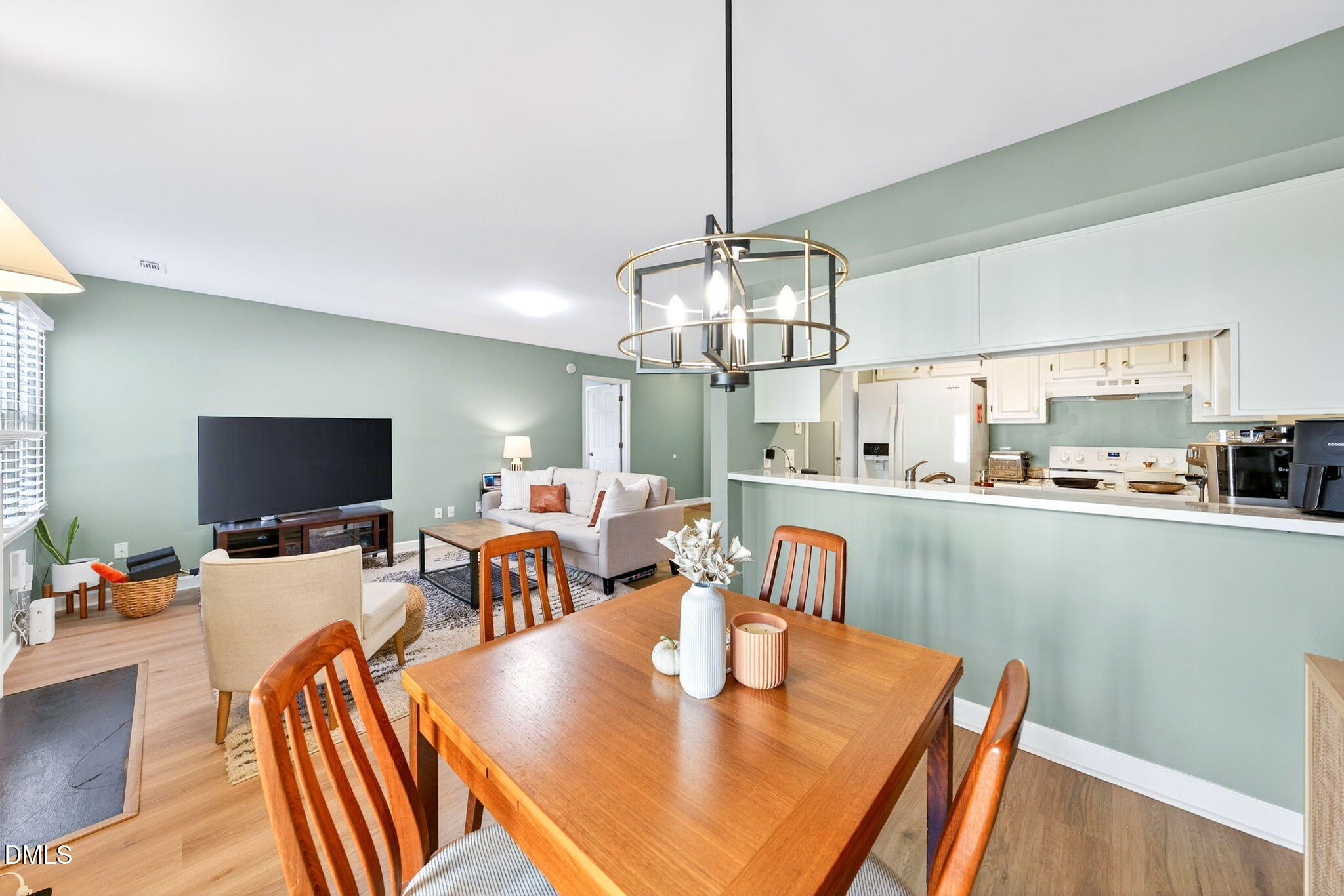 3307 Tarleton West Durham, NC 27713 - Photo 11 of 39 a view of a dining room with furniture and wooden floor