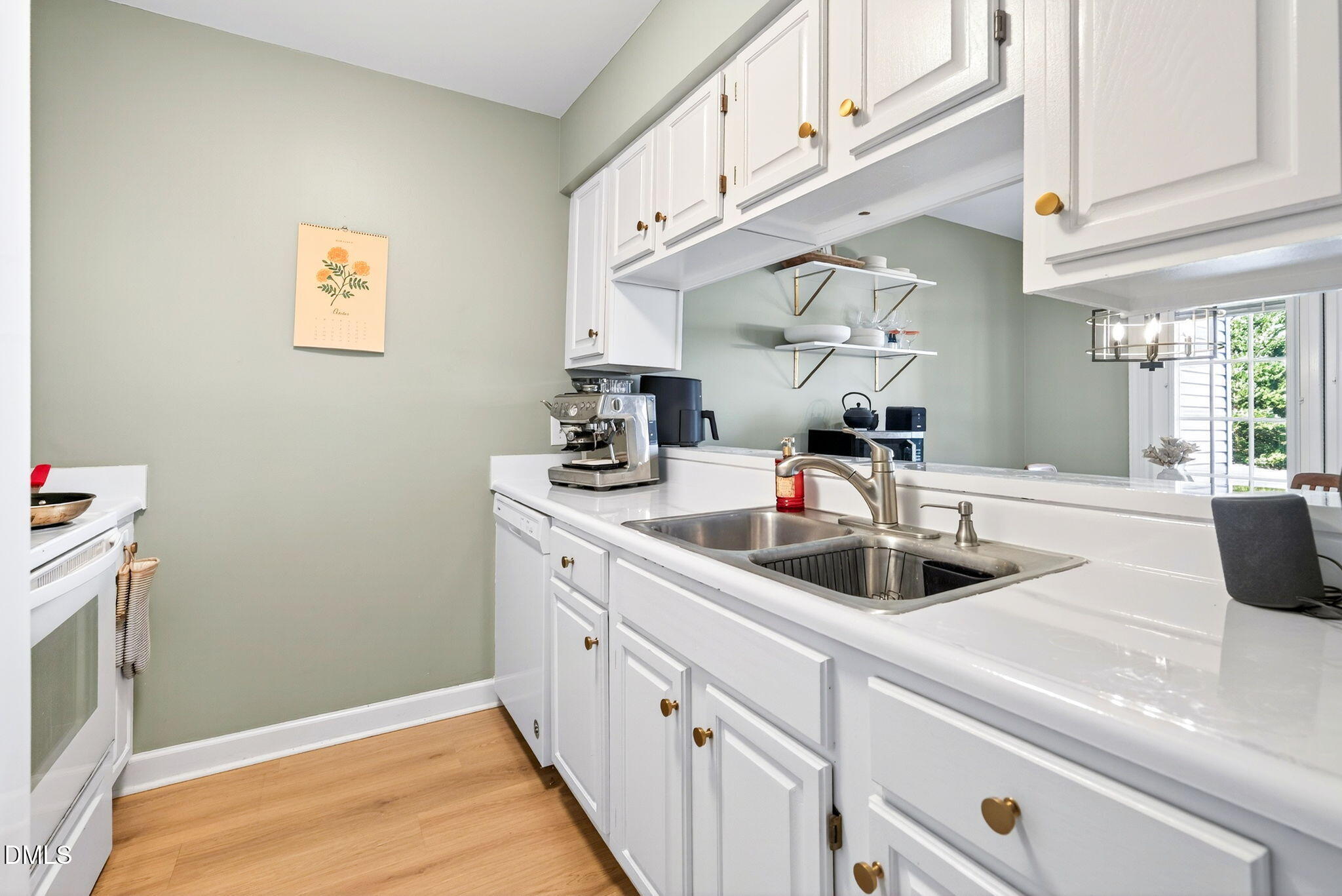 3307 Tarleton West Durham, NC 27713 - Photo 16 of 39 a kitchen with sink and mirror