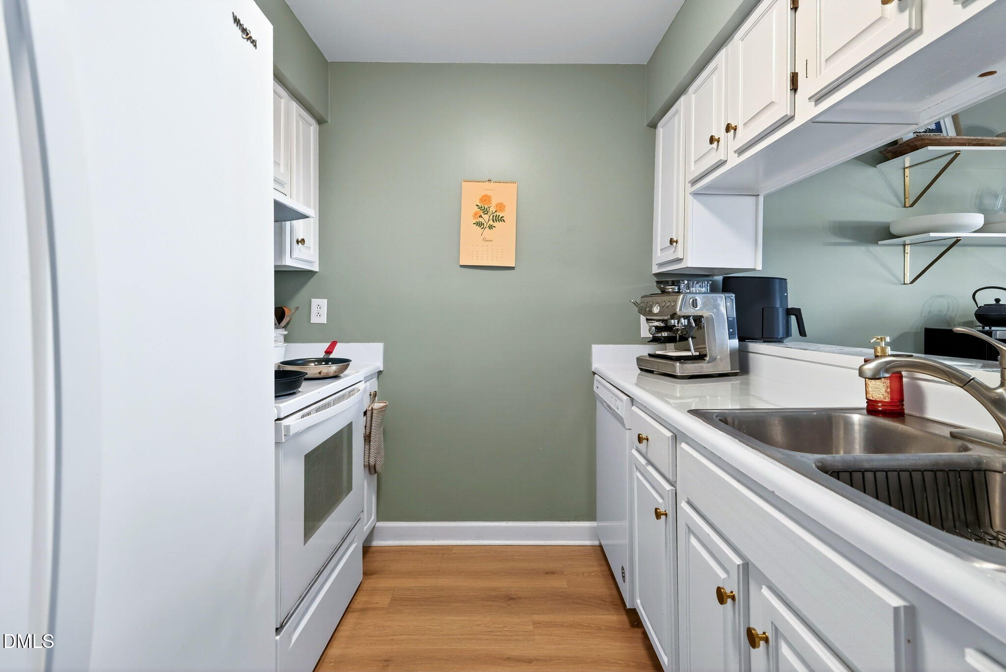 3307 Tarleton West Durham, NC 27713 - Photo 17 of 39 a kitchen with cabinets and a sink