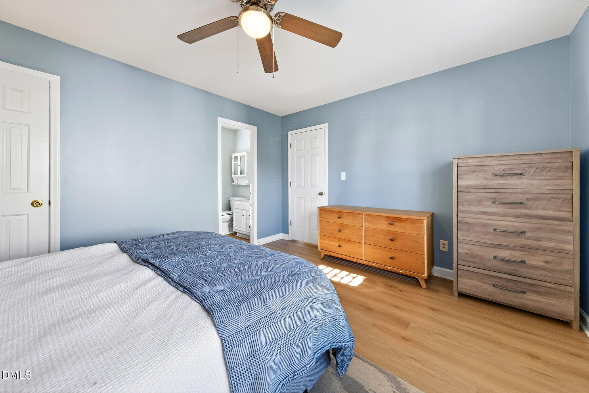 3307 Tarleton West Durham, NC 27713 - Photo 20 of 39 a bedroom with a bed and a dresser