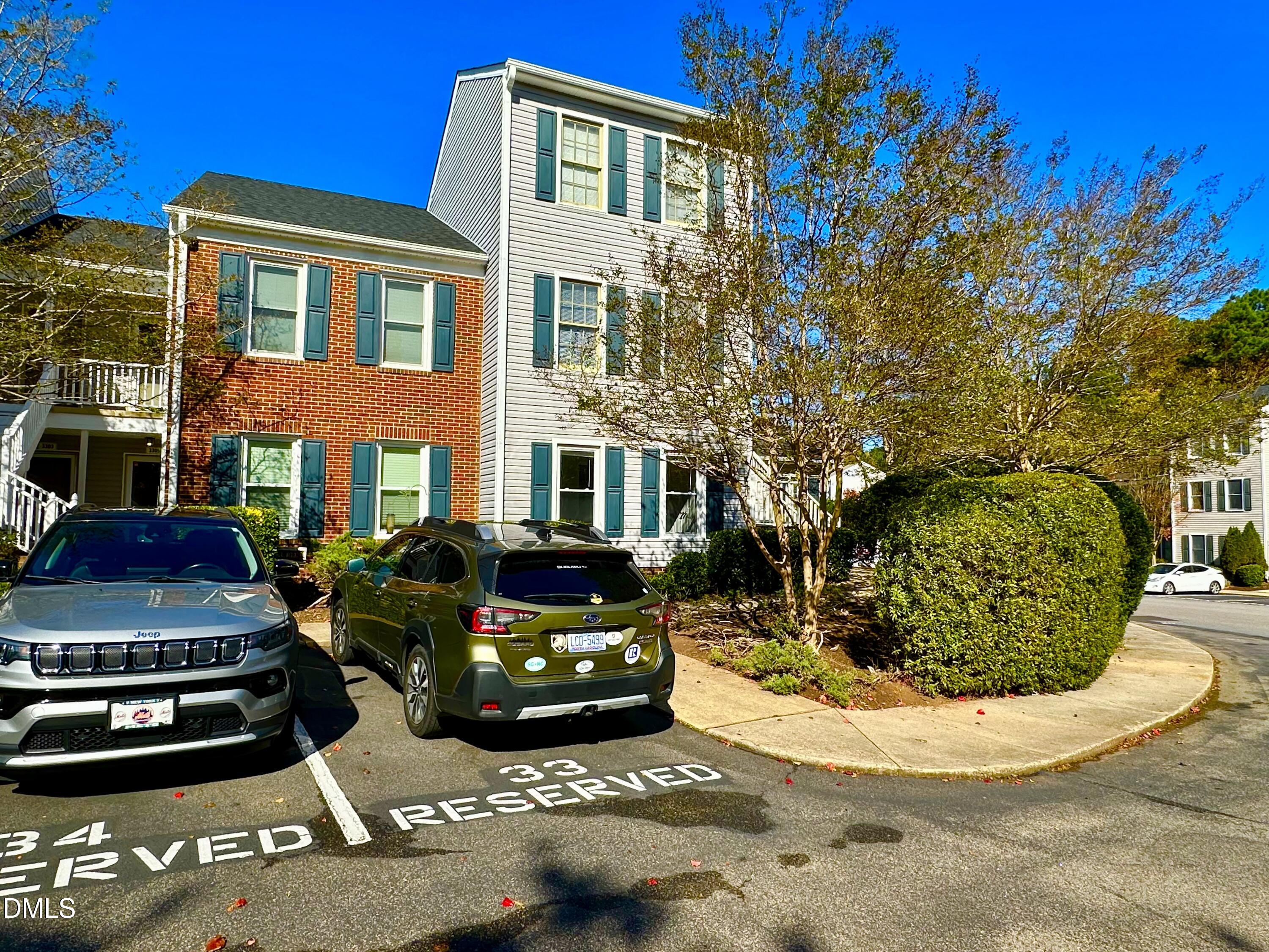 3307 Tarleton West Durham, NC 27713 - Photo 2 of 39 a front view of a house with a yard