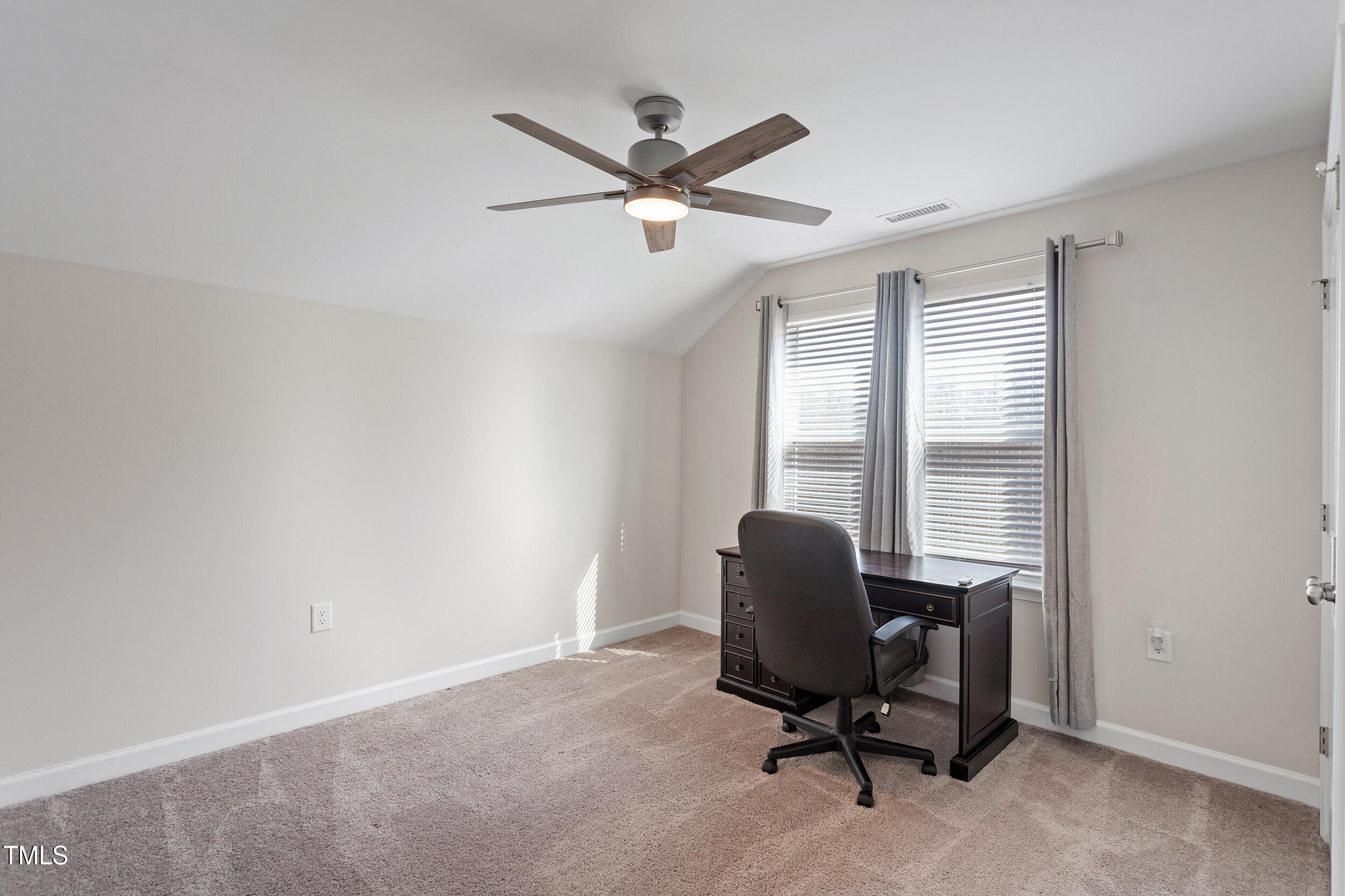 201 Northview Drive Middlesex, NC 27557 - Photo 16 of 25 a work room with furniture and windows