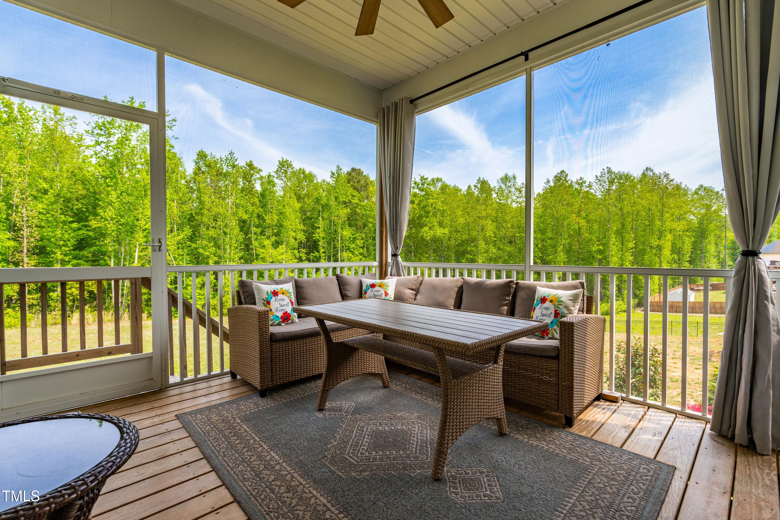 201 Northview Drive Middlesex, NC 27557 - Photo 19 of 25 a living room with large windows and furniture