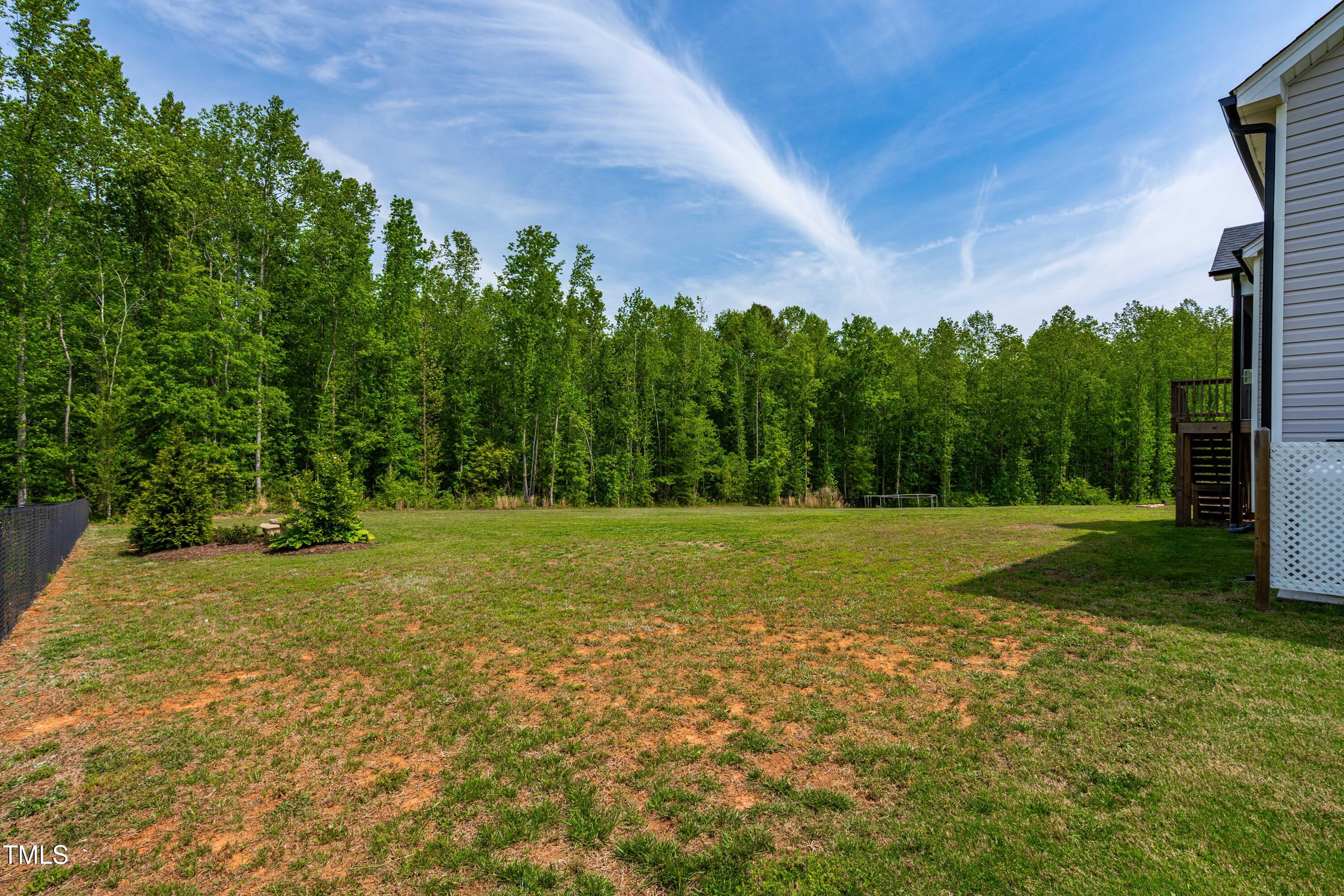 201 Northview Drive Middlesex, NC 27557 - Photo 5 of 25 a view of a field with trees in the background
