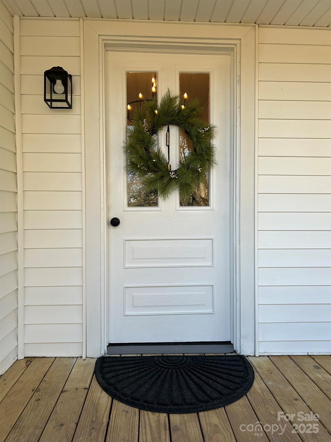 464 Hamrick Road Mooresboro, NC 28114 - Photo 14 of 48 a view of a entryway door of the house