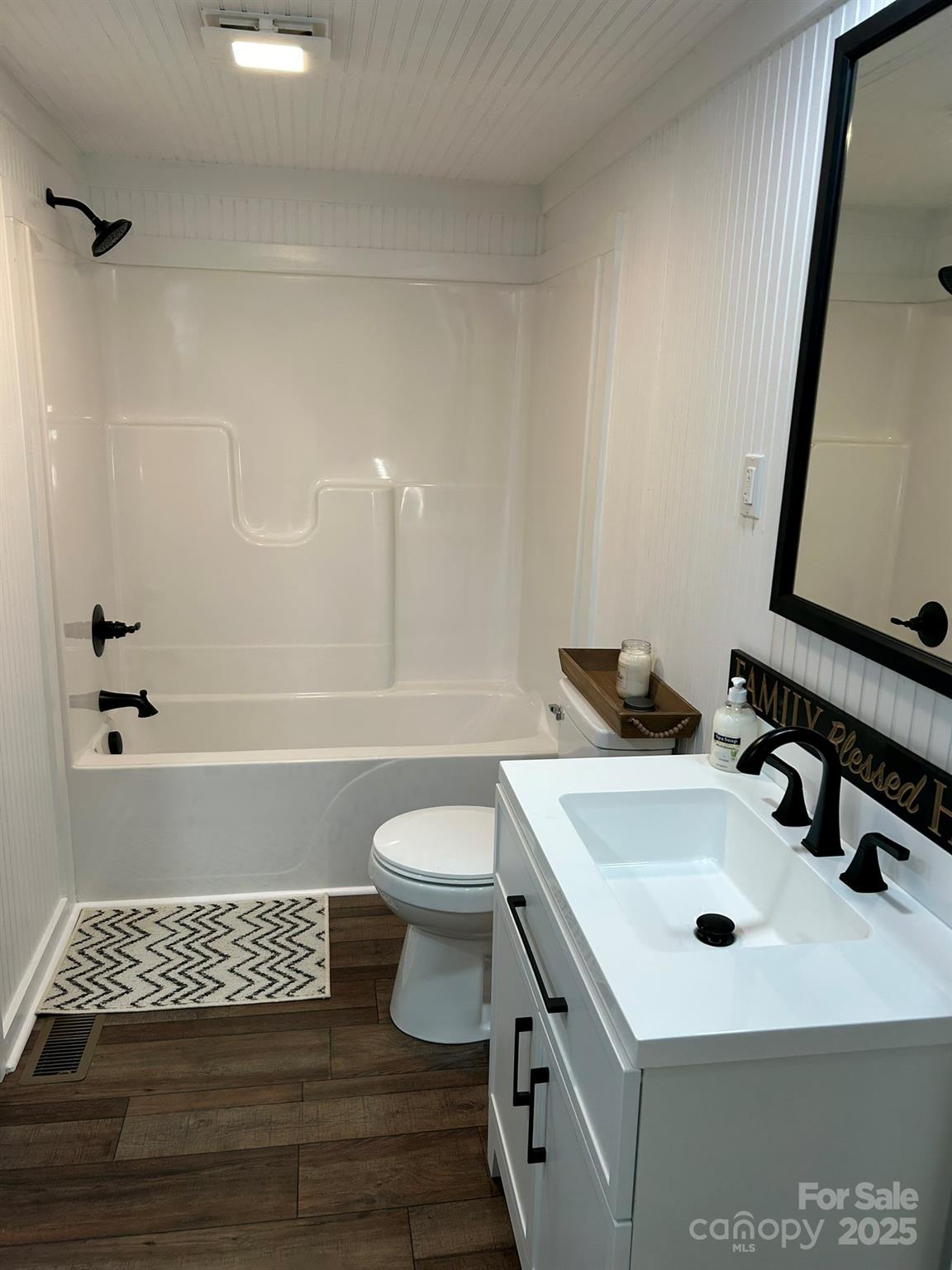 464 Hamrick Road Mooresboro, NC 28114 - Photo 25 of 48 a bathroom with a sink a toilet and shower