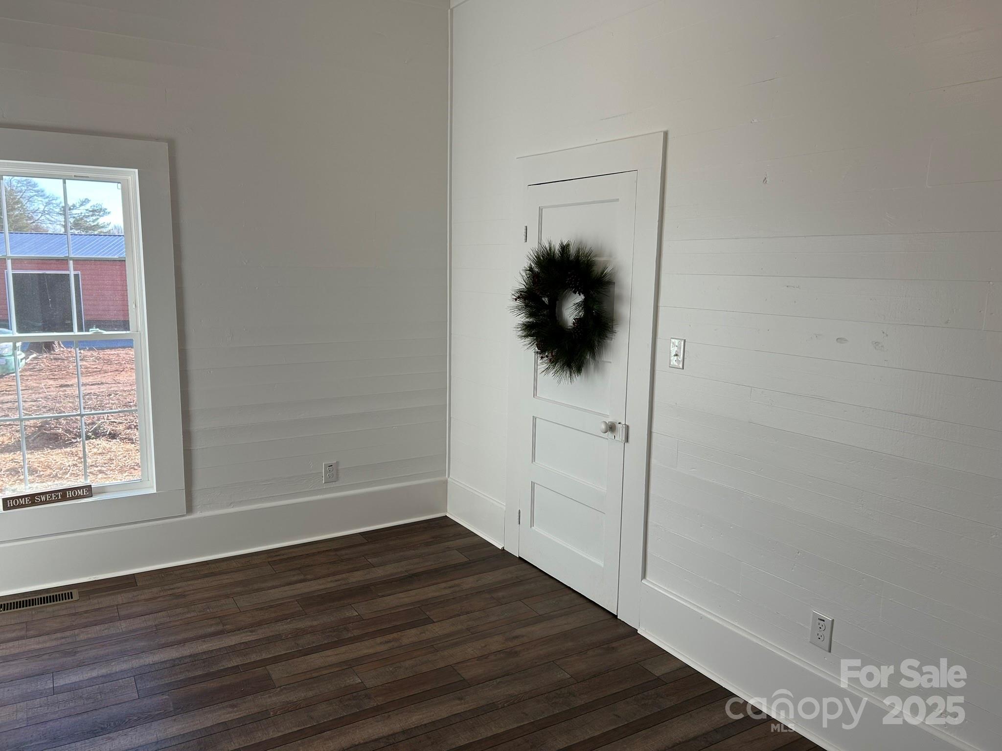 464 Hamrick Road Mooresboro, NC 28114 - Photo 30 of 48 a view of small space with wooden floor and a window
