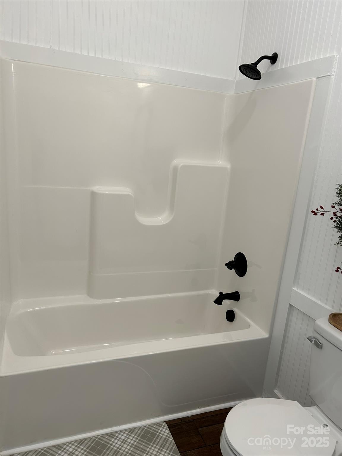 464 Hamrick Road Mooresboro, NC 28114 - Photo 42 of 48 a bathroom with a bathtub and a toilet