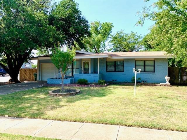 768 Pine Street Hurst, TX 76053 - Photo 1 of 1 Ranch-style home featuring brick siding, a front lawn, fence, and an attached garage