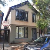 a front view of a house with yard