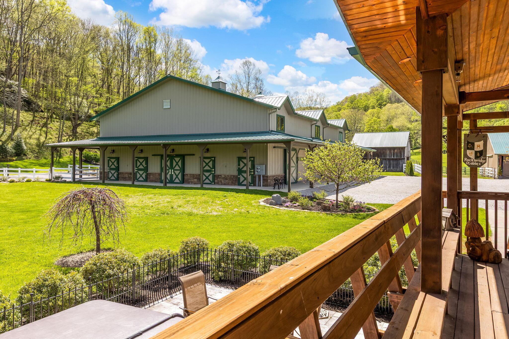 26019 Bailey Road Rockbridge, OH 43149 - Photo 101 of 110 View of barndominium from the deck of farmhouse
