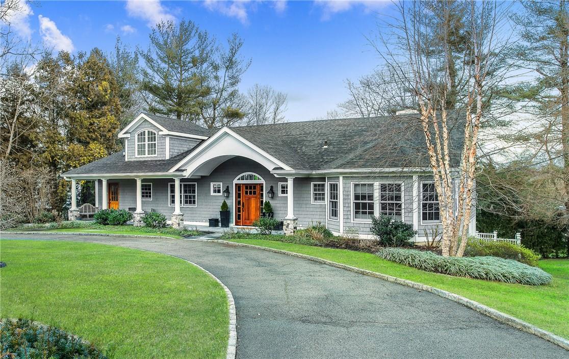 521 Purchase Street Rye, NY 10580 - Photo 1 of 1 a front view of a house with a yard