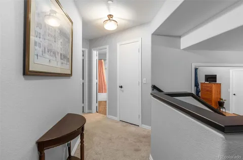 a view of a hallway with workspace