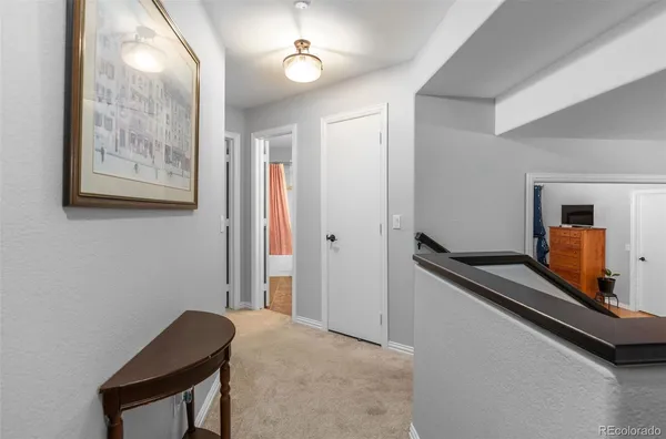 a view of a hallway with workspace