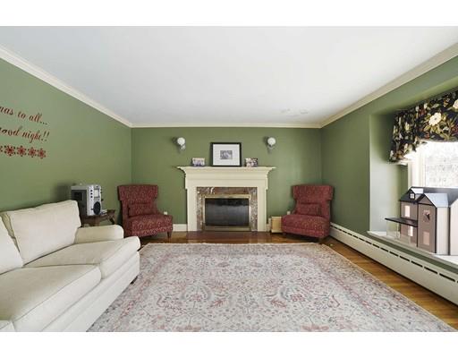930 Main Street Hingham, MA 02043 - Photo 11 of 30 a living room with furniture and a fireplace
