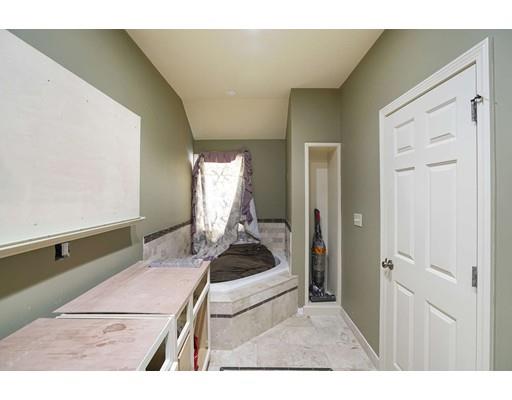 930 Main Street Hingham, MA 02043 - Photo 16 of 30 a room with a bed and a cabinets