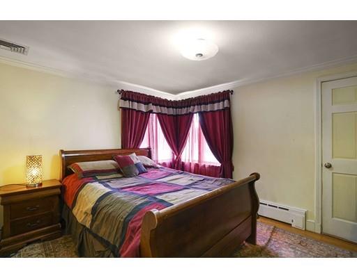 930 Main Street Hingham, MA 02043 - Photo 21 of 30 a bedroom with a bed and a window