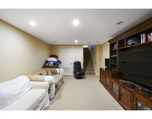 930 Main Street Hingham, MA 02043 - Photo 24 of 30 a living room with furniture and a flat screen tv