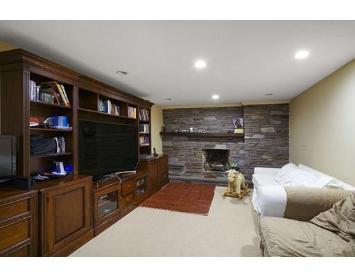 930 Main Street Hingham, MA 02043 - Photo 25 of 30 a living room with furniture and a flat screen tv