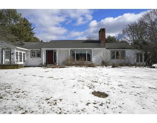 930 Main Street Hingham, MA 02043 - Photo 3 of 30 a front view of house with yard covered in snow