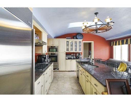 930 Main Street Hingham, MA 02043 - Photo 7 of 30 a kitchen with a counter space a sink and appliances