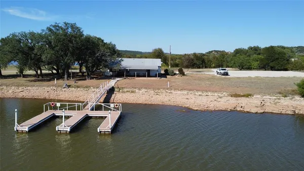 a view of a lake with a house