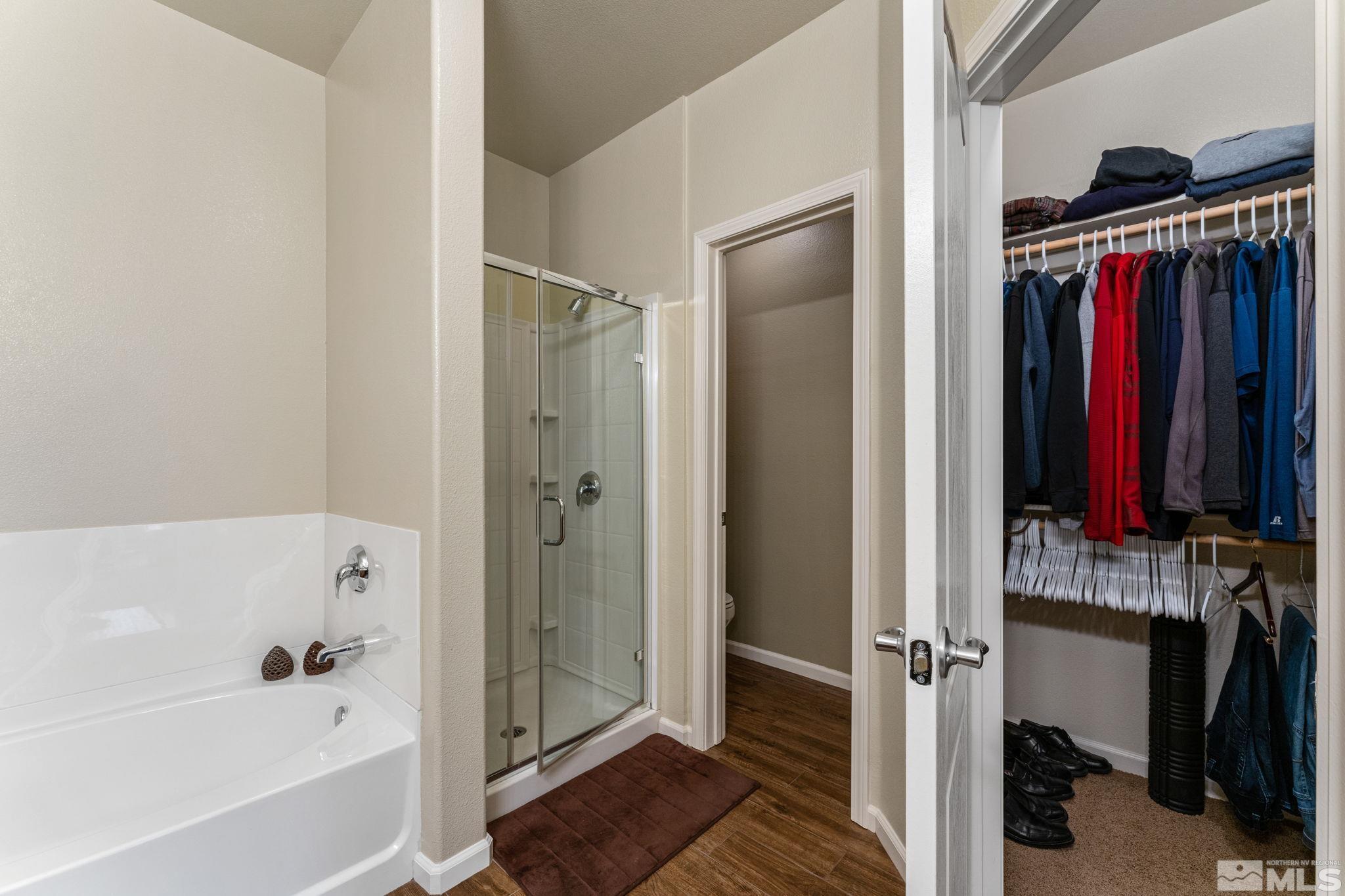 9050 Double R Boulevard, Unit 921 Reno, NV 89521 - Photo 25 of 39 a view of a bathroom with tub and shower