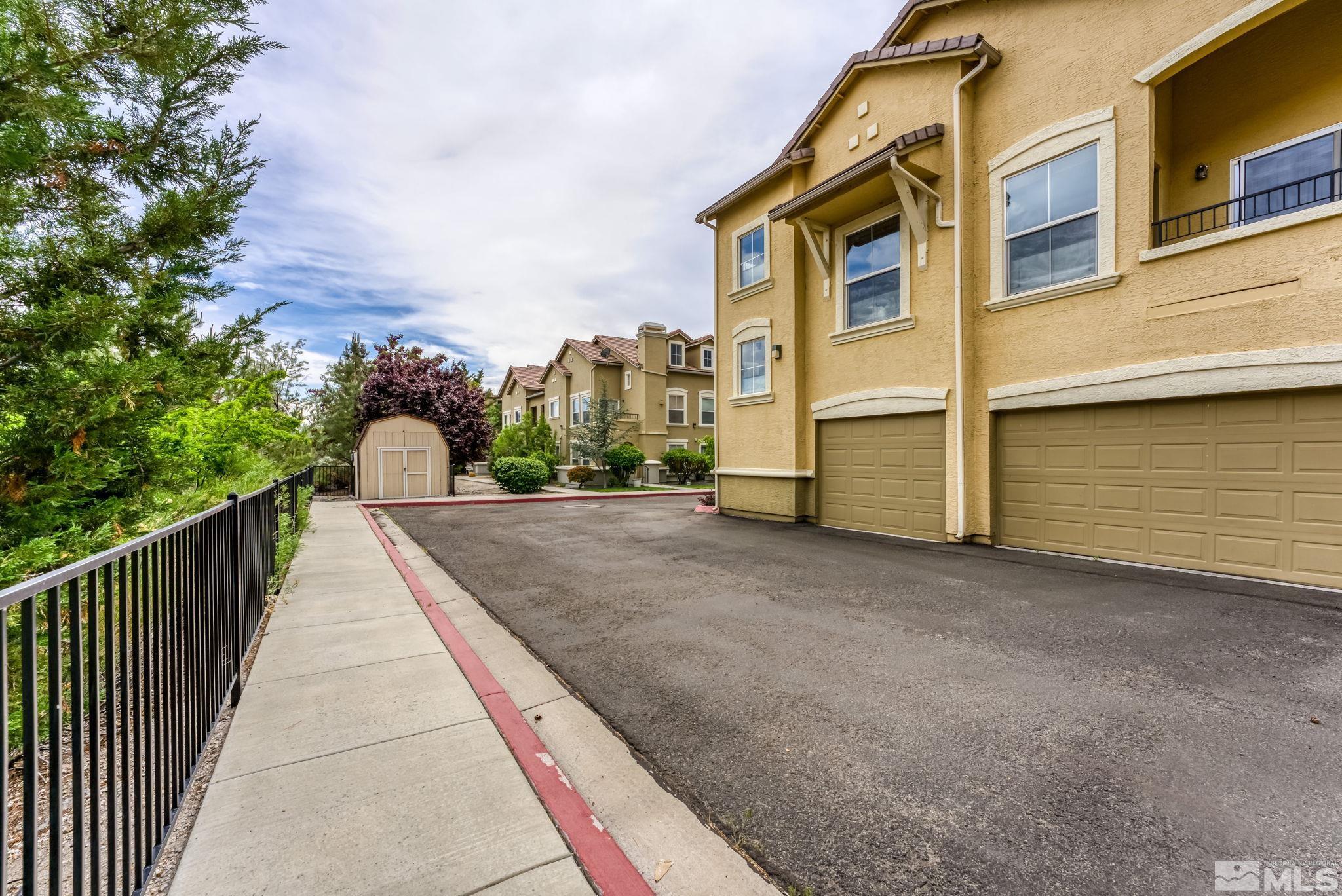 9050 Double R Boulevard, Unit 921 Reno, NV 89521 - Photo 33 of 39 a view of a house with a street