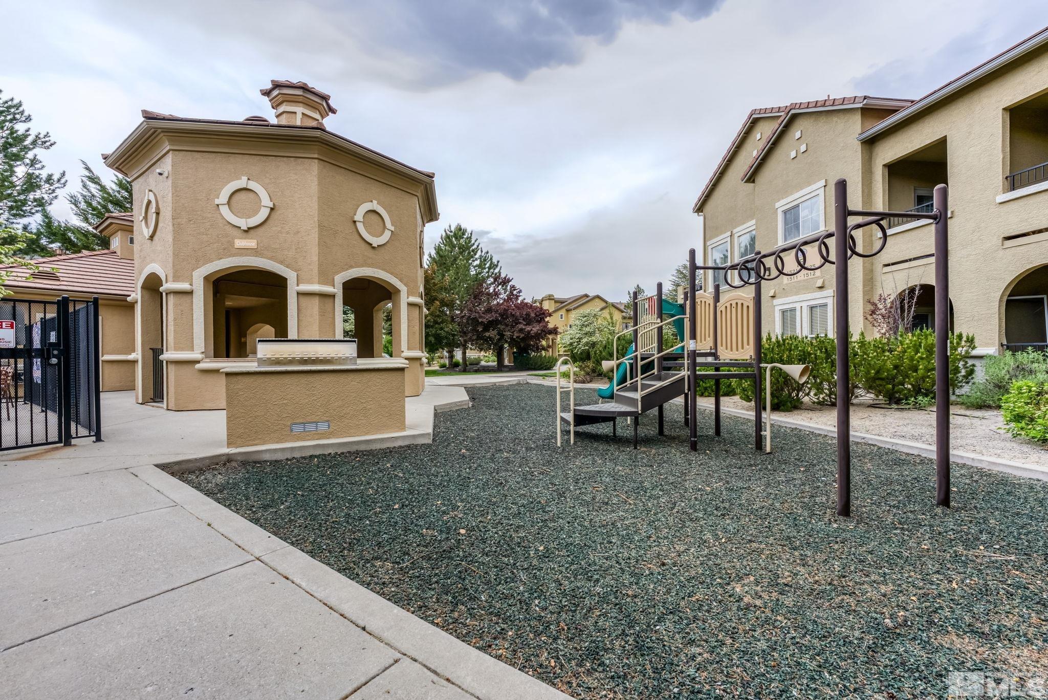 9050 Double R Boulevard, Unit 921 Reno, NV 89521 - Photo 38 of 39 a view of a house with a outdoor space