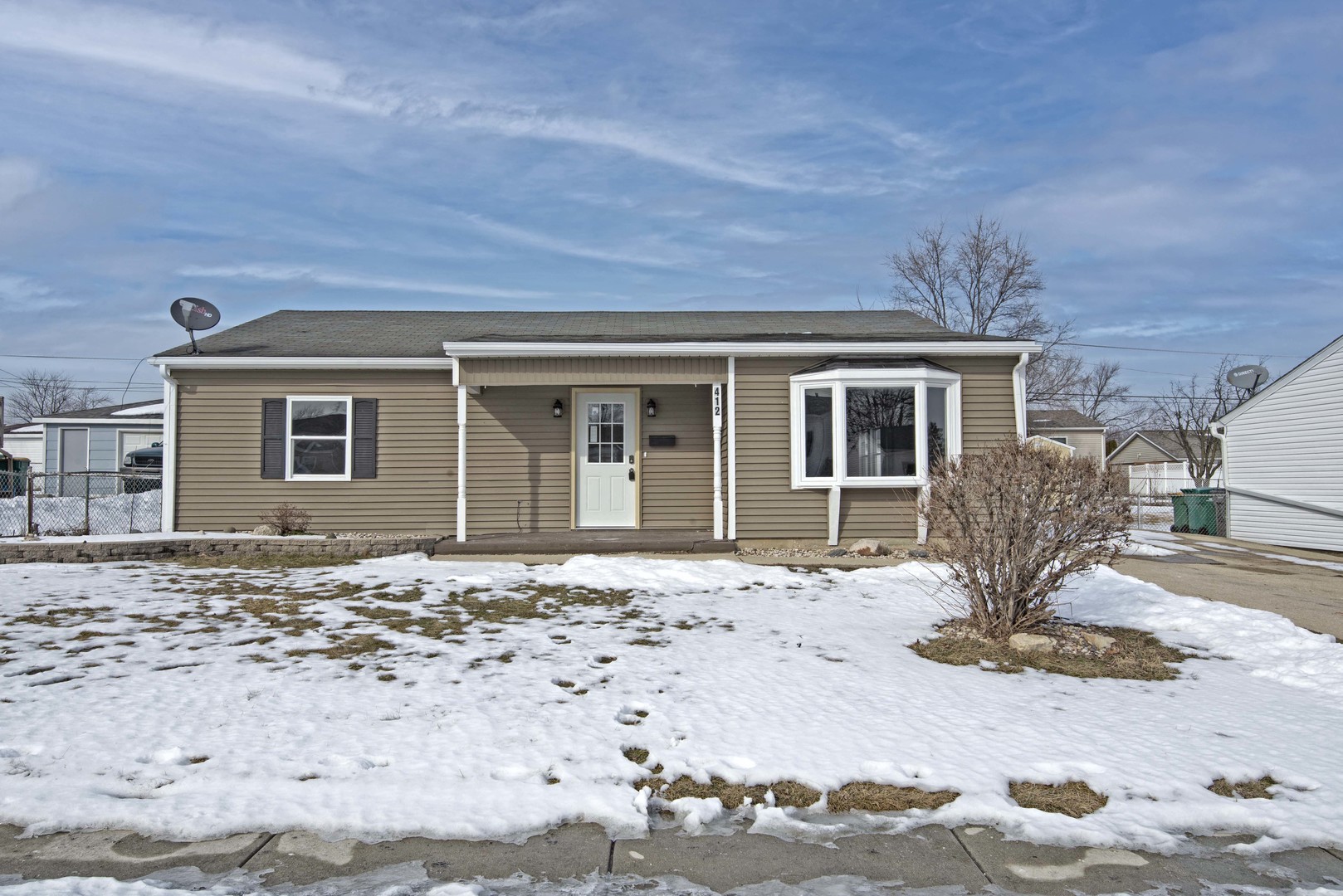 412 Haller Avenue Romeoville, IL 60446 - Photo 1 of 19 a front view of a house with parking space