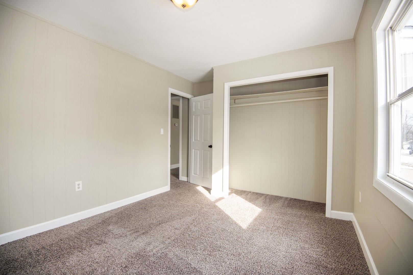412 Haller Avenue Romeoville, IL 60446 - Photo 11 of 19 an empty room with windows and closet