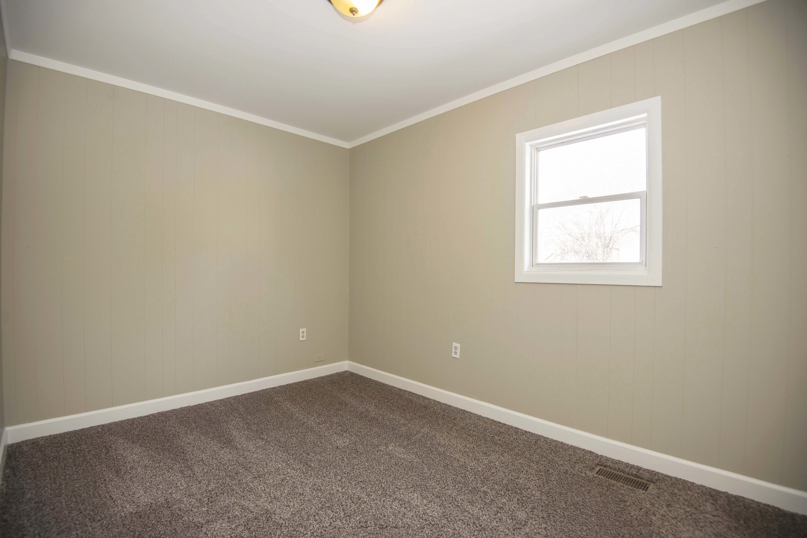 412 Haller Avenue Romeoville, IL 60446 - Photo 12 of 19 an empty room with a window