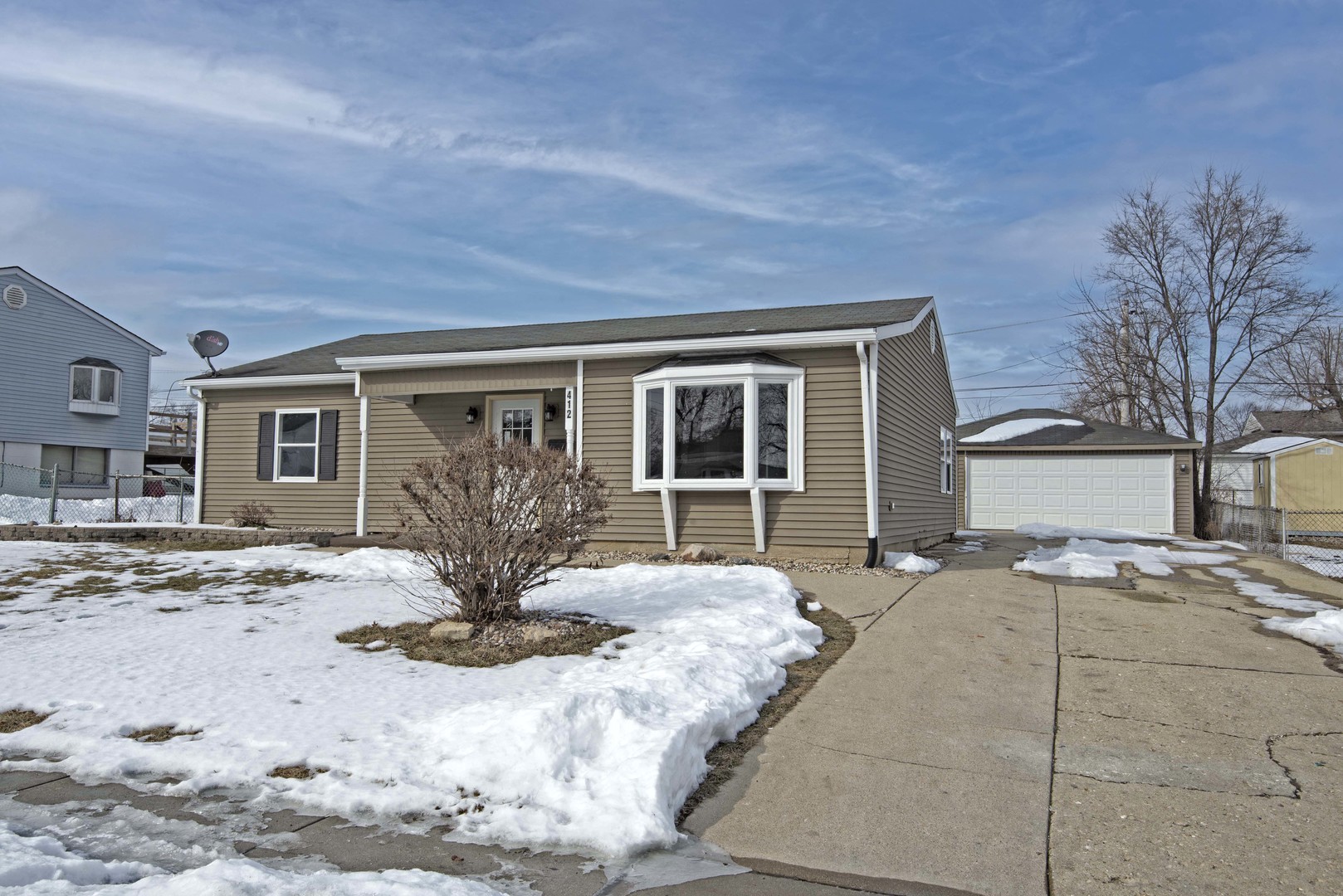 412 Haller Avenue Romeoville, IL 60446 - Photo 2 of 19 a view of a house with snow on the floor