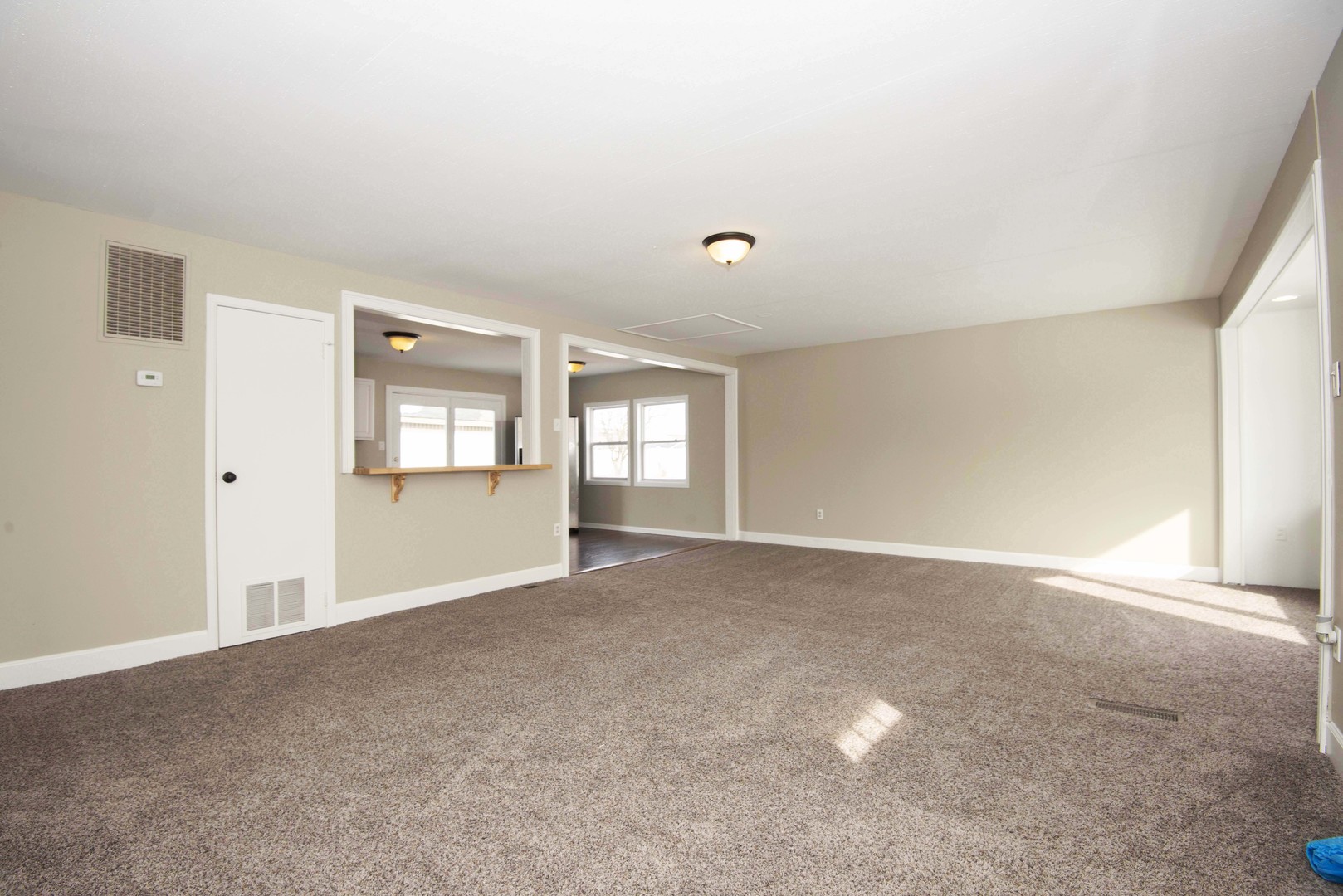 412 Haller Avenue Romeoville, IL 60446 - Photo 3 of 19 a view of an empty room with window