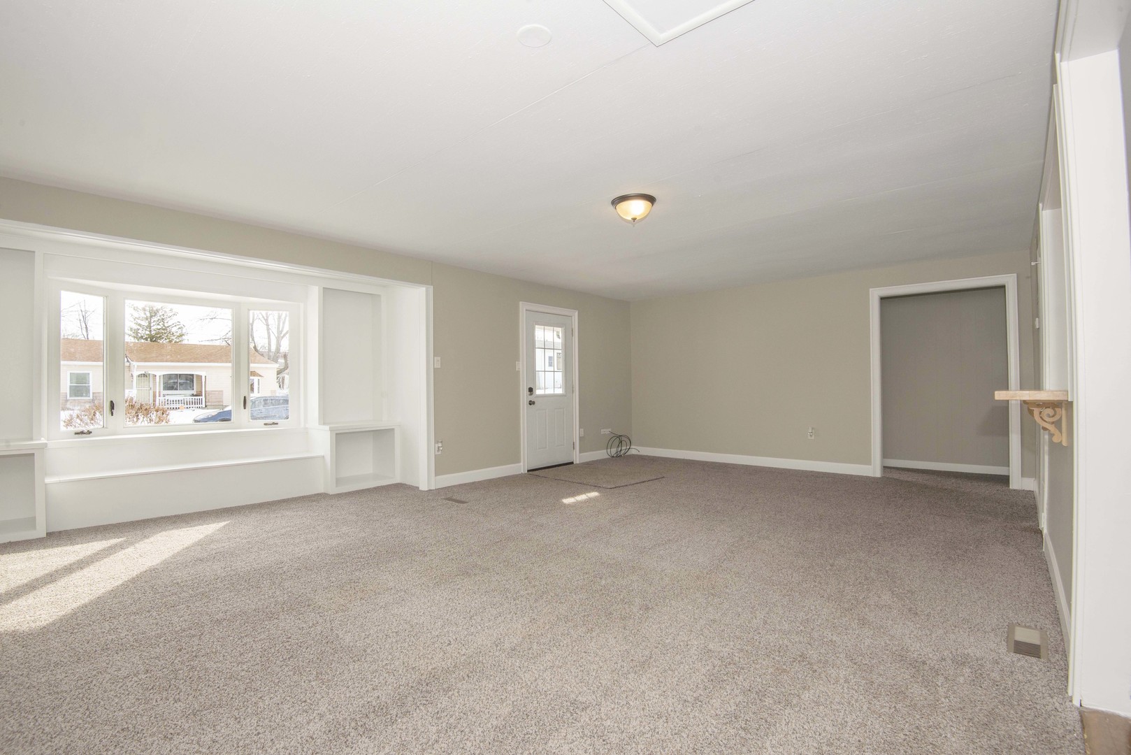 412 Haller Avenue Romeoville, IL 60446 - Photo 5 of 19 a view of an empty room with a window
