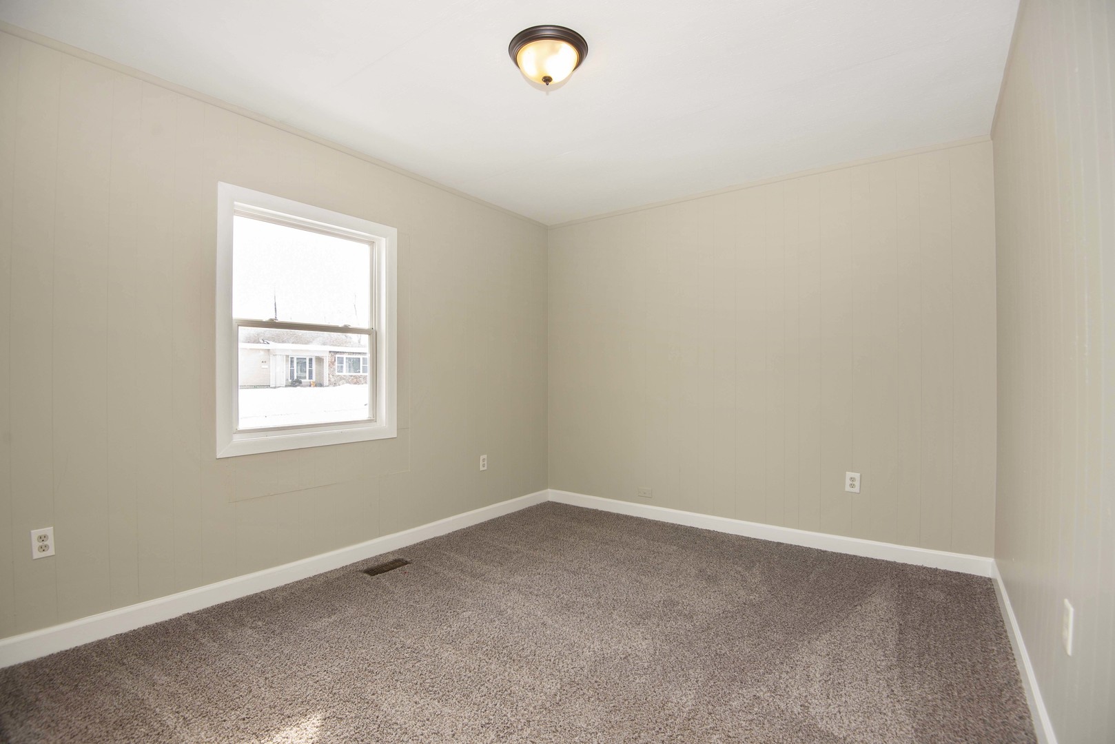 412 Haller Avenue Romeoville, IL 60446 - Photo 10 of 19 an empty room with a window