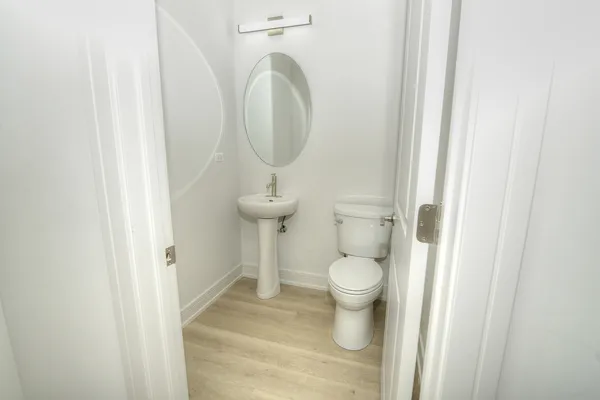 a bathroom with a toilet and a sink