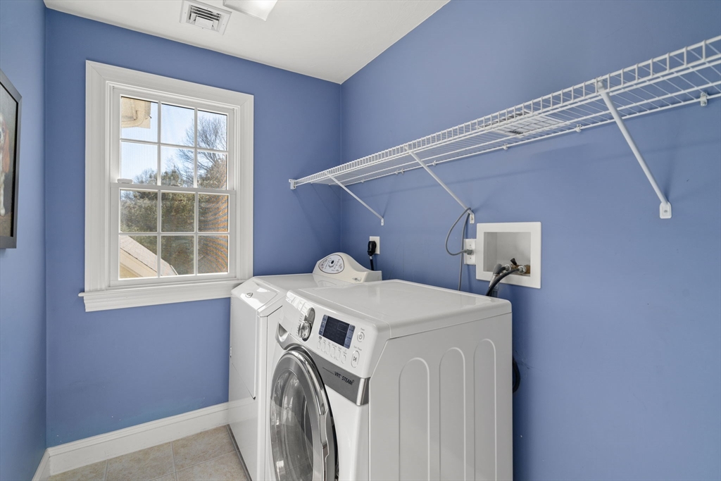 36 Sherman's Bridge Road Wayland, MA 01778 - Photo 26 of 39 a utility room with dryer and washer