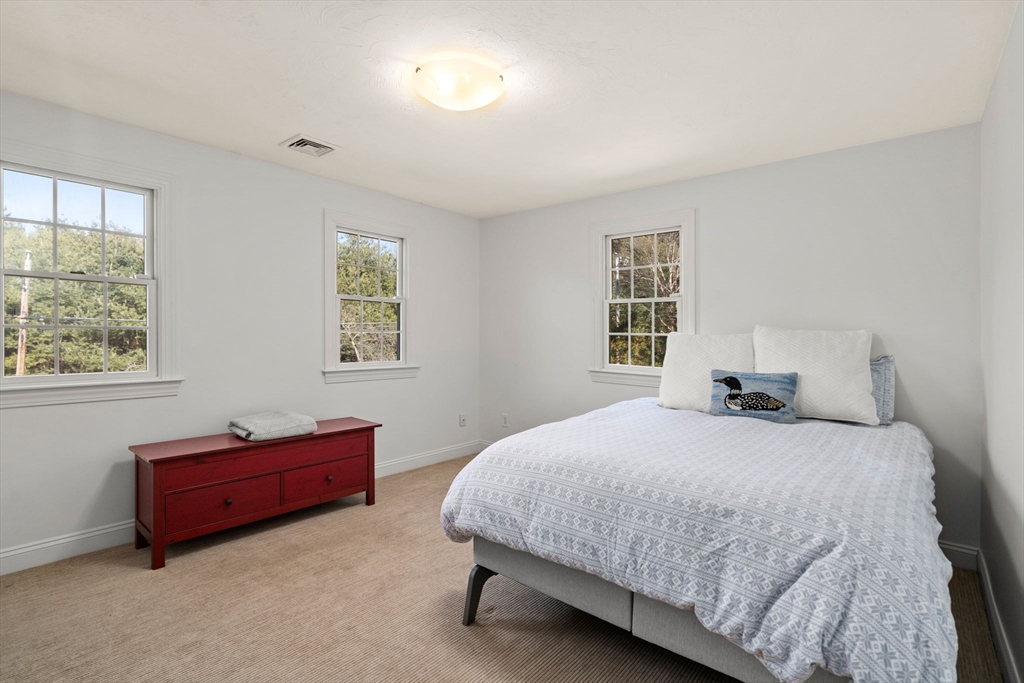 36 Sherman's Bridge Road Wayland, MA 01778 - Photo 27 of 39 a bedroom with bed and window
