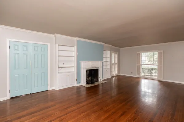 a kitchen with stainless steel appliances granite countertop a sink a stove and refrigerator