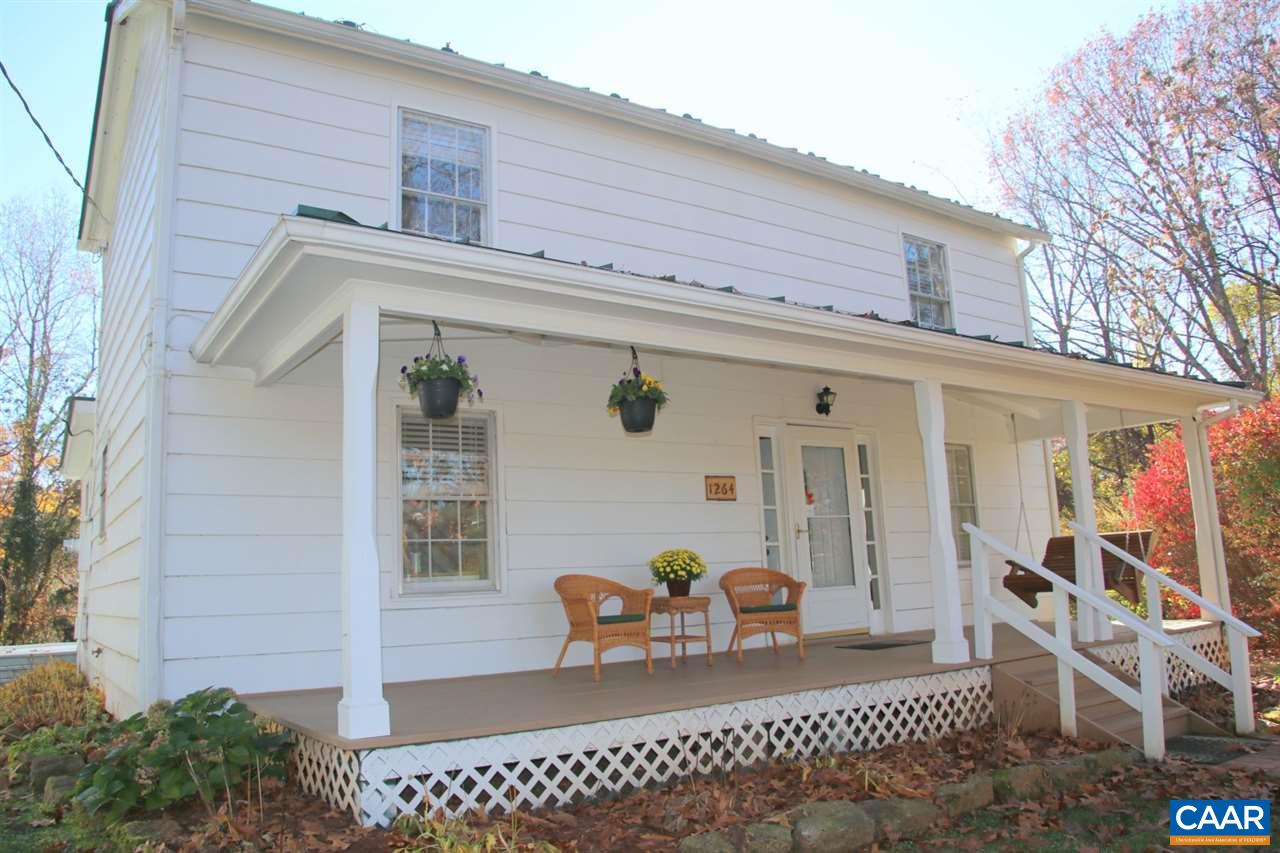 1264 Ridgeview Road Reva, VA 22735 - Photo 1 of 43 a view of a patio with table and chairs and potted plants