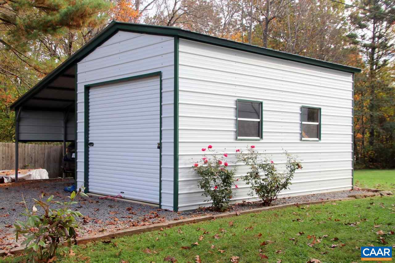 1264 Ridgeview Road Reva, VA 22735 - Photo 3 of 43 a front view of a house with a yard