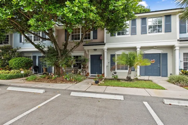 front view of a house with a small yard