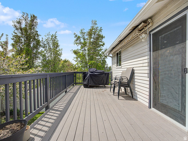 523 Mountain View Road Centerville, UT 84014 - Photo 23 of 33 Wooden deck featuring grilling area