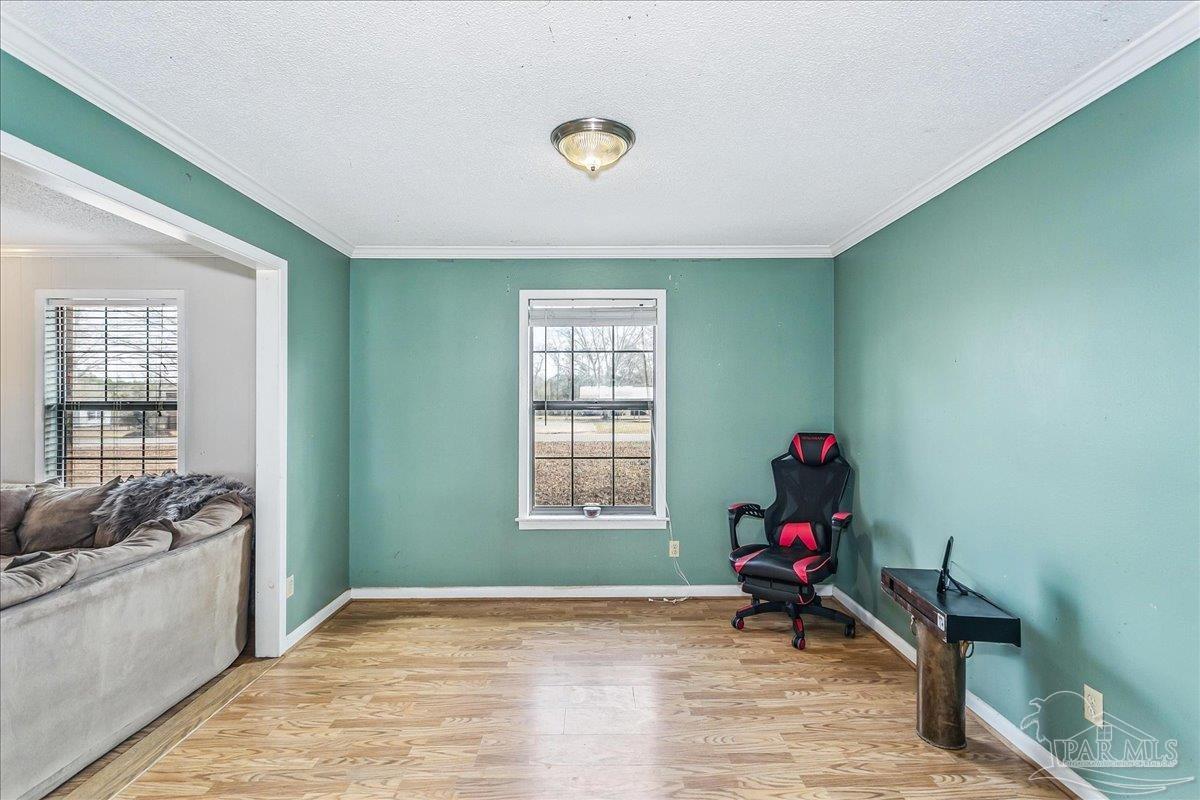 295 Columbus Circle Brewton, AL 36426 - Photo 10 of 32 a view of livingroom with furniture and windows
